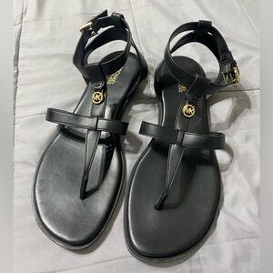 Michael Kors Black thong sandals size 10. Leather. $19.